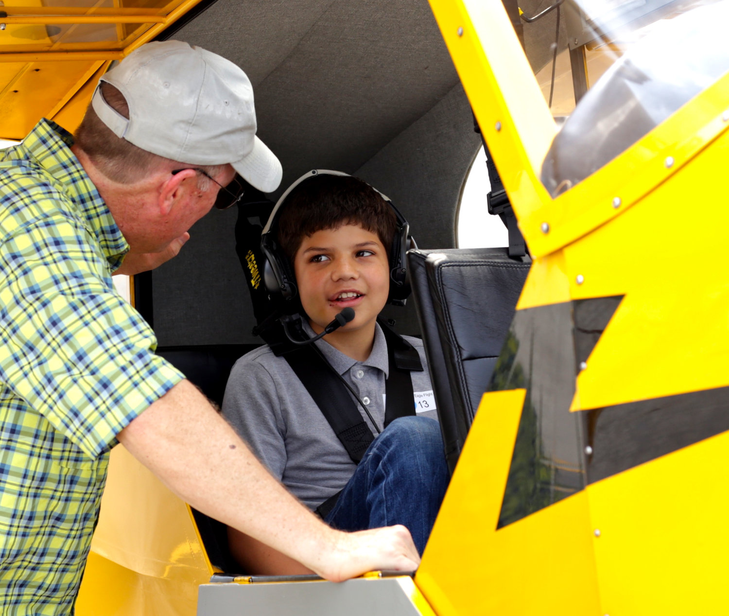 Pilot John Wisdom preps a Young Eagle for his flight.